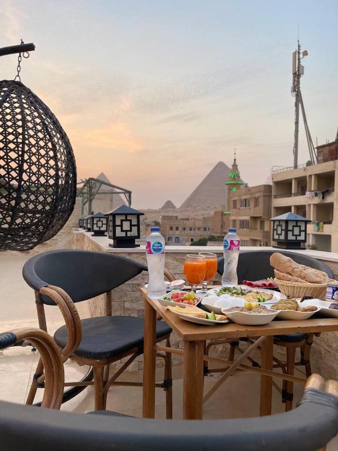 Locanda Pyramids Hotel Kafret el-Gabal 外观 照片