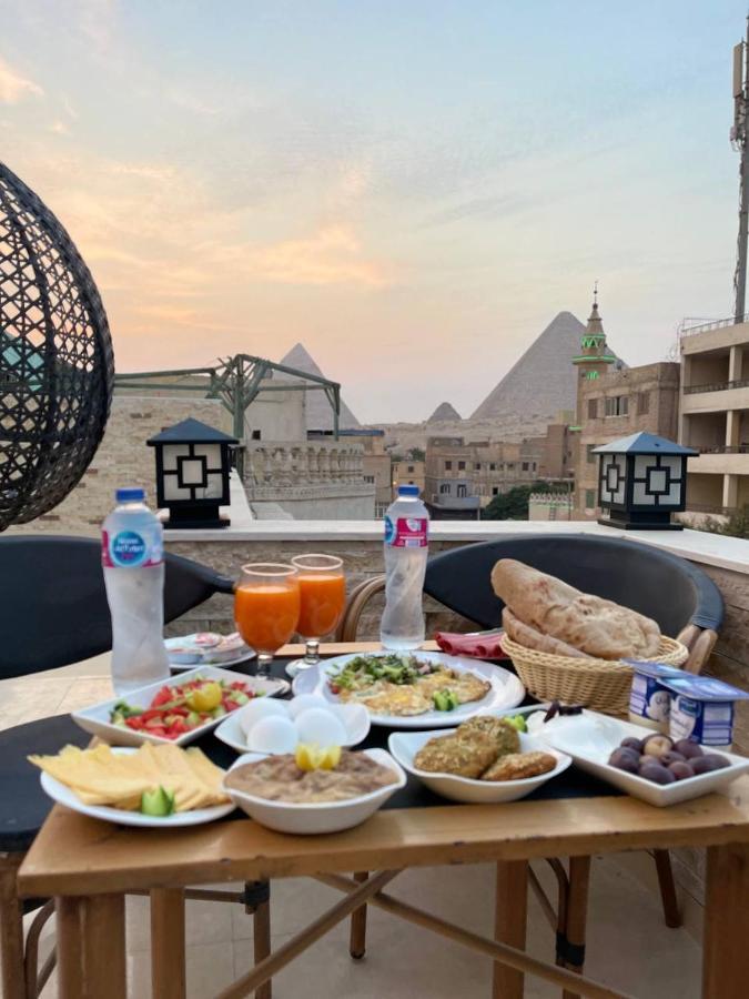 Locanda Pyramids Hotel Kafret el-Gabal 外观 照片